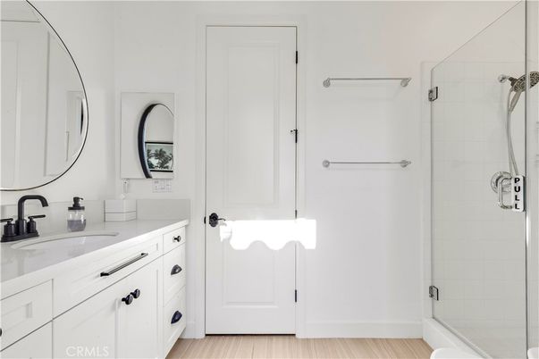 Bathroom, Dual Sink Vanities, Glass Shower, Interior, Wood Texture Flooring