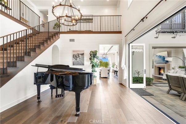 Chandelier, Fireplace, Interior, Pendant Lights, Piano, Wood Texture Flooring