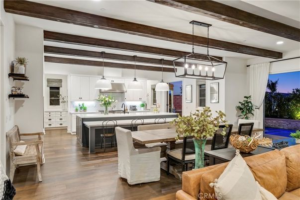 Chandelier, Dining room, Interior, Kitchen, Pendant Lights, Recessed Lighting, Wooden Beams, Wood Texture Flooring