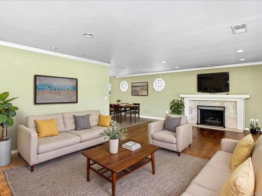 Dining room, Fireplace, Interior, Living room, Recessed Lighting, Wood Texture Flooring