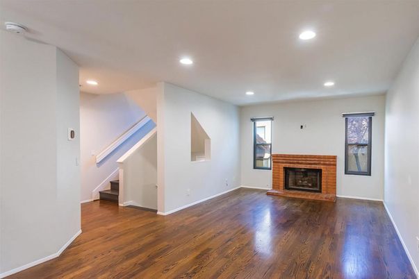 Empty room, Fireplace, Interior, Recessed Lighting, Wood Texture Flooring