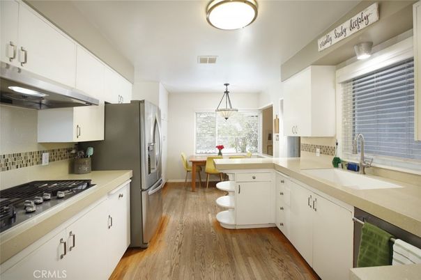 Dining room, Interior, Kitchen, Pendant Lights, Stainless Steel Appliances, Wood Texture Flooring