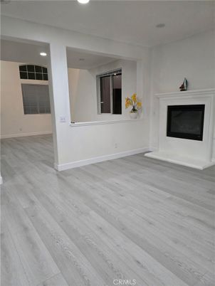 Empty room, Fireplace, Interior, Recessed Lighting, Wood Texture Flooring