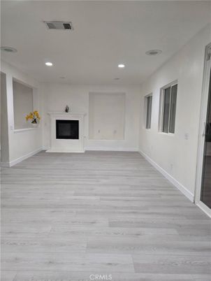Empty room, Fireplace, Interior, Recessed Lighting, Wood Texture Flooring