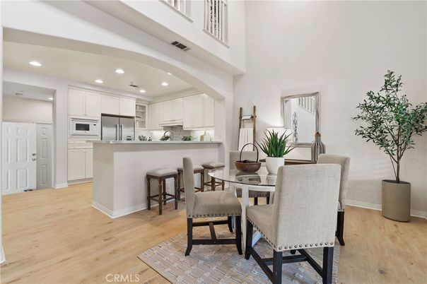 Dining room, Interior, Kitchen, Recessed Lighting, Stainless Steel Appliances, Wood Texture Flooring