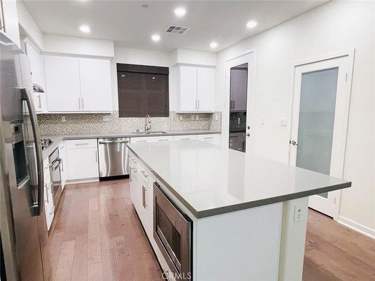 Interior, Kitchen, Recessed Lighting, Stainless Steel Appliances, Wood Texture Flooring