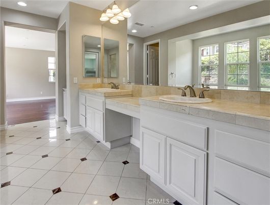 Bathroom, Dual Sink Vanities, Interior, Recessed Lighting, Tile Countertops, Wood Texture Flooring