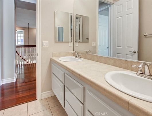 Bathroom, Dual Sink Vanities, Interior, Tile Countertops, Wood Texture Flooring