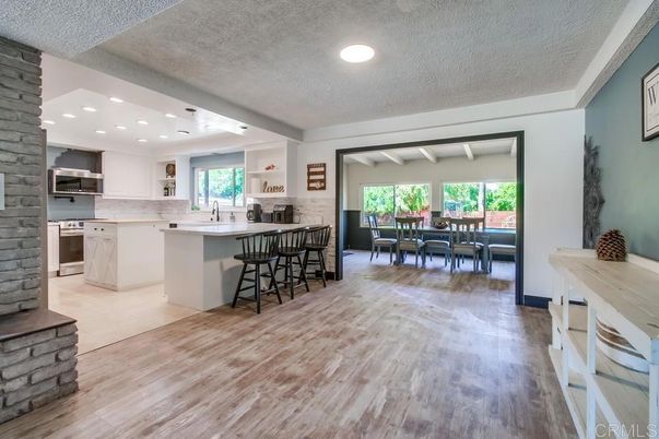 Dining room, Interior, Kitchen, Recessed Lighting, Stainless Steel Appliances, Wood Texture Flooring