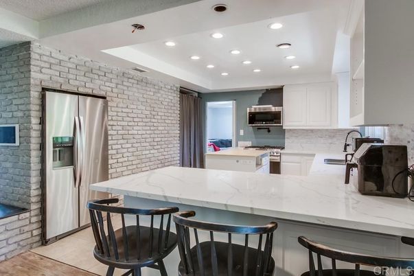 Interior, Kitchen, Recessed Lighting, Stainless Steel Appliances, Stone Walls