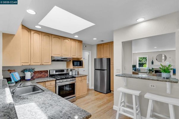 Interior, Kitchen, Recessed Lighting, Stainless Steel Appliances, Wood Texture Flooring