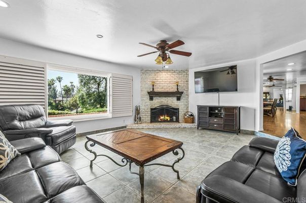 Fireplace, Interior, Living room, Recessed Lighting, Stone Walls, Wood Texture Flooring