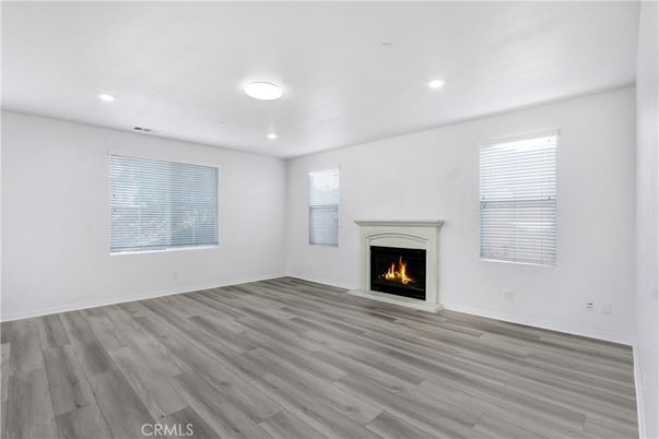 Empty room, Fireplace, Interior, Recessed Lighting, Wood Texture Flooring