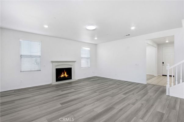 Empty room, Fireplace, Interior, Recessed Lighting, Wood Texture Flooring