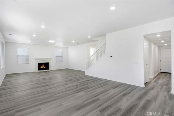 Empty room, Fireplace, Interior, Recessed Lighting, Wood Texture Flooring