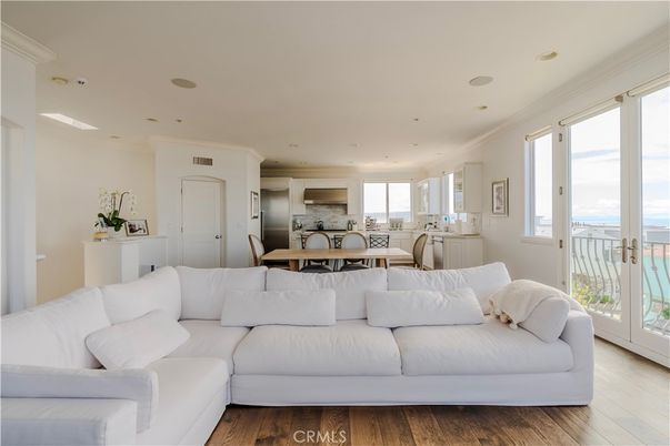 Dining room, Interior, Kitchen, Living room, Recessed Lighting, Water, Wood Texture Flooring