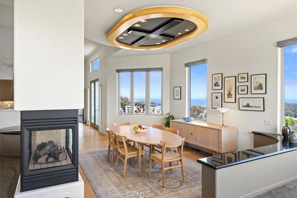 Dining room, Fireplace, Interior, Recessed Lighting, Water, Wood Texture Flooring