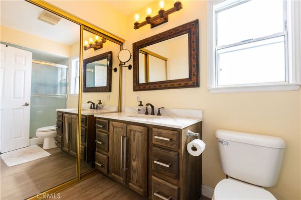 Bathroom, Dual Sink Vanities, Glass Shower, Interior, Wood Texture Flooring