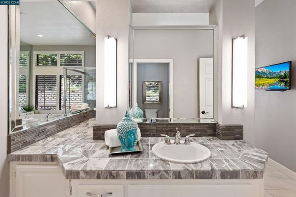 Bathroom, Dual Sink Vanities, Interior, Marble, Recessed Lighting, Tile Countertops