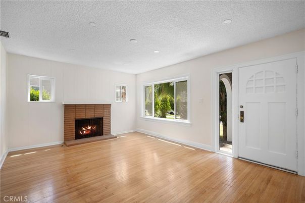 Empty room, Fireplace, Interior, Recessed Lighting, Wood Texture Flooring