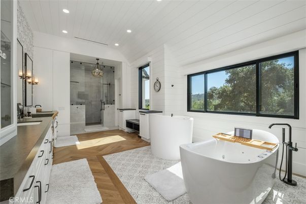 Bathroom, Free Standing Baths, Glass Shower, Interior, Recessed Lighting, Wood Texture Flooring