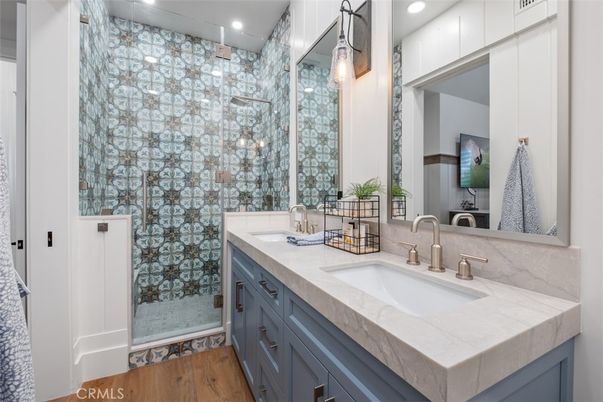 Bathroom, Dual Sink Vanities, Glass Shower, Interior, Recessed Lighting, Wood Texture Flooring