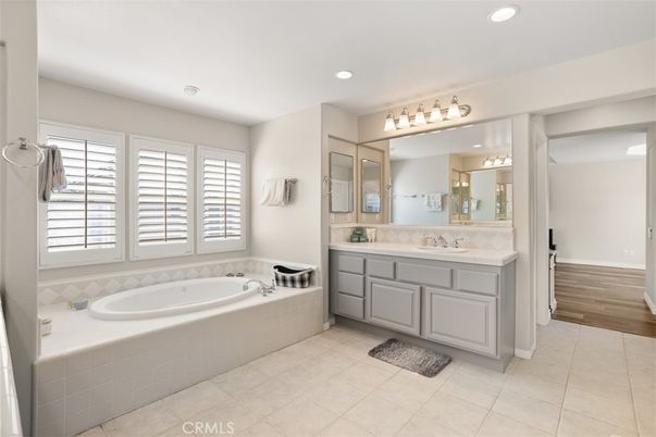 Bathroom, Dual Sink Vanities, Interior, Recessed Lighting, Wood Texture Flooring