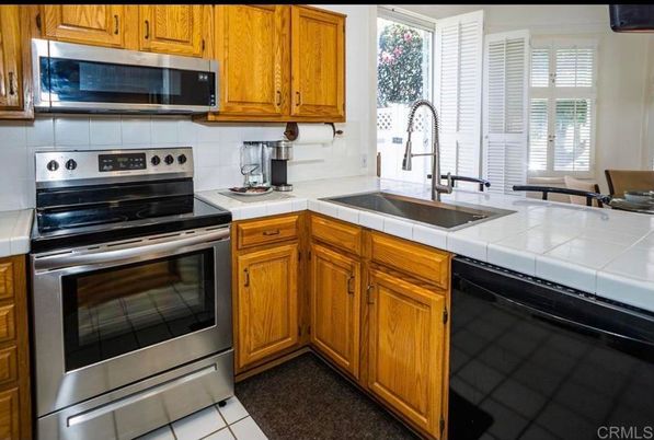 Interior, Kitchen, Stainless Steel Appliances, Tile Countertops