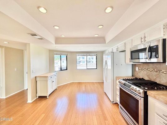 Interior, Kitchen, Recessed Lighting, Stainless Steel Appliances, Wood Texture Flooring