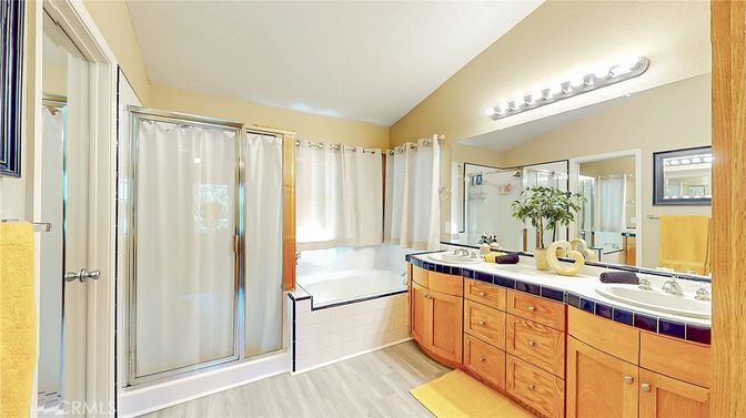 Bathroom, Dual Sink Vanities, Glass Shower, Interior, Tile Countertops, Wood Texture Flooring