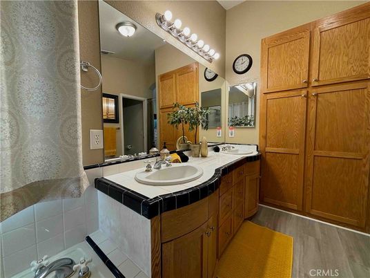 Bathroom, Dual Sink Vanities, Interior, Tile Countertops, Wood Texture Flooring