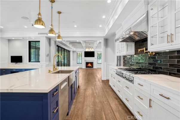 Fireplace, Interior, Kitchen, Pendant Lights, Recessed Lighting, Stainless Steel Appliances, Wood Texture Flooring