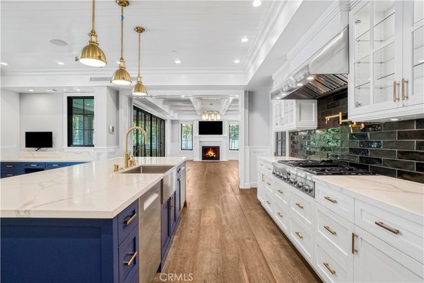 Fireplace, Interior, Kitchen, Pendant Lights, Recessed Lighting, Stainless Steel Appliances, Wood Texture Flooring