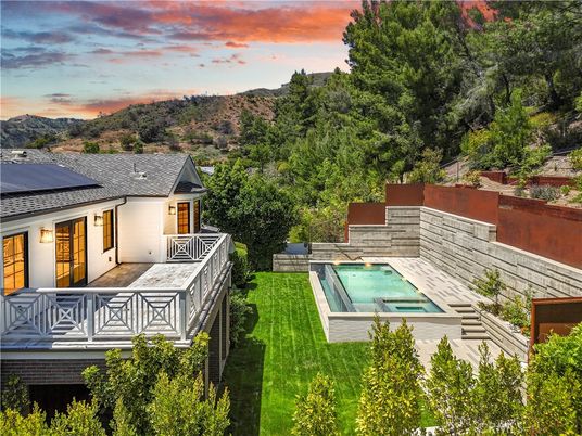 Exterior, Pool, Solar Panels