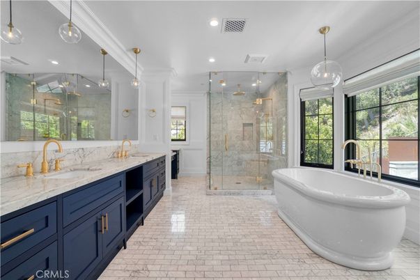 Bathroom, Dual Sink Vanities, Free Standing Baths, Glass Shower, Interior, Marble Walls, Pendant Lights, Recessed Lighting
