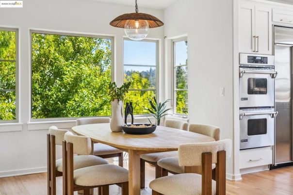 Dining room, Interior, Kitchen, Pendant Lights, Stainless Steel Appliances, Wood Texture Flooring