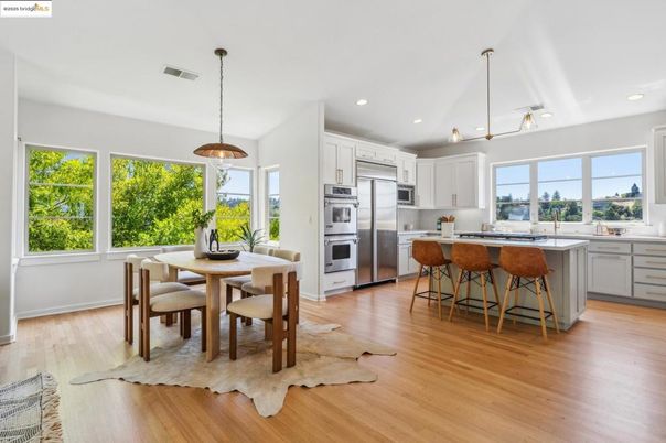 Dining room, Interior, Kitchen, Pendant Lights, Recessed Lighting, Stainless Steel Appliances, Wood Texture Flooring