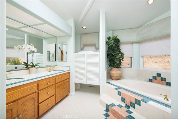 Bathroom, Dual Sink Vanities, Interior, Recessed Lighting, Tile Countertops