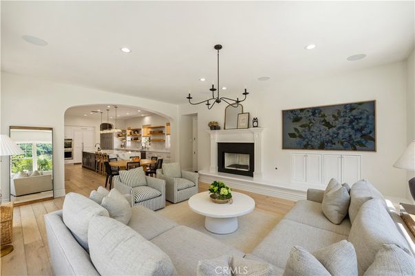 Dining room, Fireplace, Interior, Kitchen, Living room, Pendant Lights, Recessed Lighting, Stainless Steel Appliances, Wood Texture Flooring