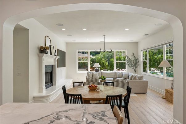 Dining room, Fireplace, Interior, Living room, Pendant Lights, Recessed Lighting, Wood Texture Flooring