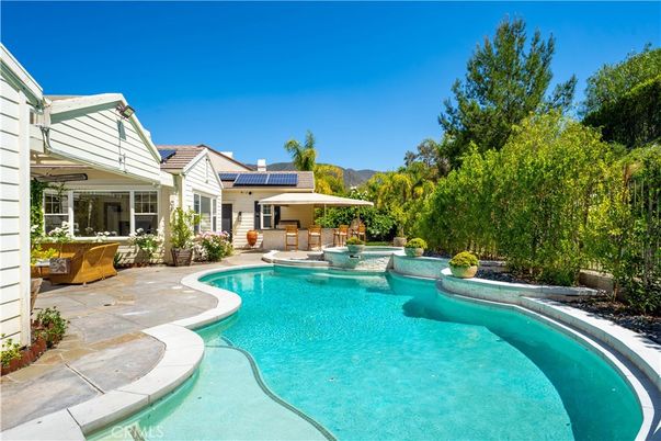 Exterior, Pool, Solar Panels