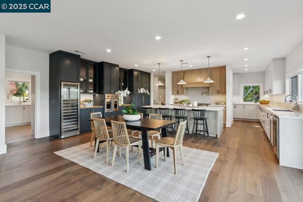 Dining room, Interior, Kitchen, Pendant Lights, Recessed Lighting, Stainless Steel Appliances, Wood Texture Flooring