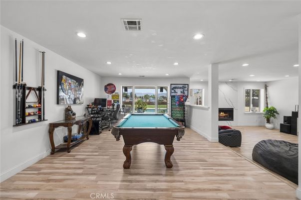 Billiard Table, Fireplace, Game Room, Interior, Recessed Lighting, Wood Texture Flooring
