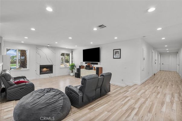 Fireplace, Interior, Living room, Recessed Lighting, Wood Texture Flooring
