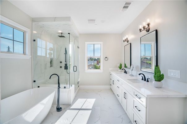 Bathroom, Dual Sink Vanities, Free Standing Baths, Glass Shower, Interior, Marble, Marble Walls, Recessed Lighting