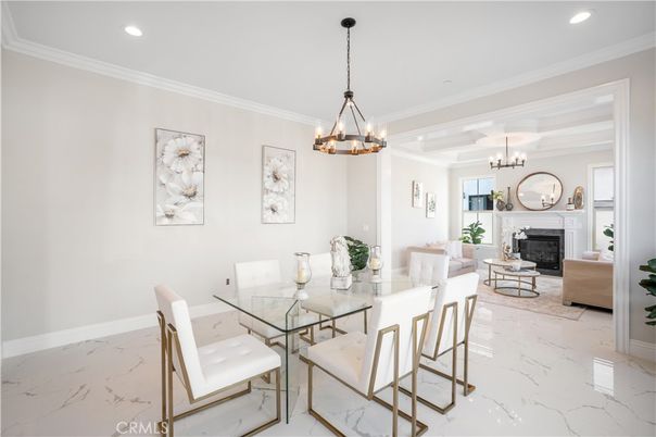 Chandelier, Dining room, Fireplace, Interior, Living room, Marble, Pendant Lights, Recessed Lighting