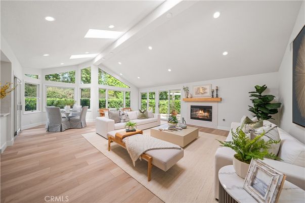 Dining room, Fireplace, Interior, Living room, Recessed Lighting, Wood Texture Flooring