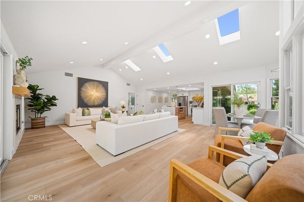 Dining room, Fireplace, Interior, Living room, Recessed Lighting, Wood Texture Flooring