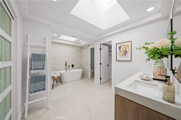 Bathroom, Dual Sink Vanities, Free Standing Baths, Interior, Marble, Marble Walls, Recessed Lighting