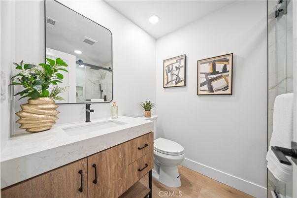 Bathroom, Glass Shower, Interior, Recessed Lighting, Wood Texture Flooring